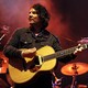A photo of Jeff Tweedy performing