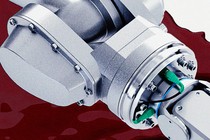 A robotic part sits in a pool of blood