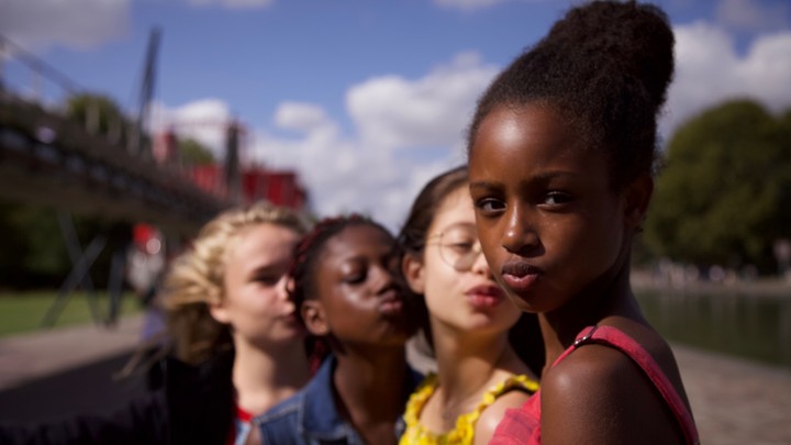 Four girls posing with kissing expressions