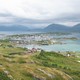 A color photograph of Sommarøy island on a cloudy day