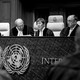 A black-and-white photograph of the judicial bench in the International Court of Justice