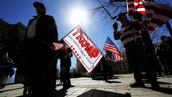 Supporters of President Trump attend a "Spirit of America" rally in Denver on February 27, 2017.