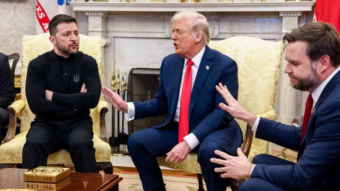 Zelensky crosses his arms as Trump and Vance put up their hands