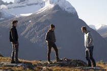 Roman, Kendall, and Lukas on the top of a mountain