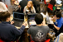 Members of "Hoya Haxa," a team of Georgetown University students, participate in a hacking competition.
