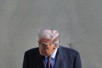 Portrait of Trump wearing a suit, angled from slightly above