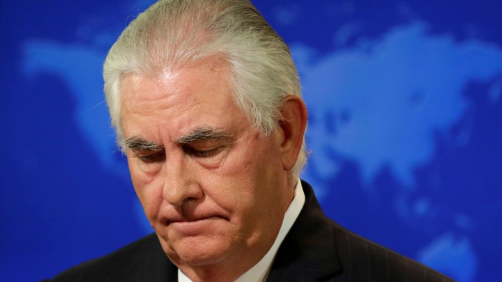 Rex Tillerson looks down