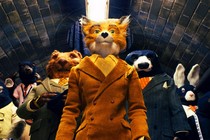 The main character of The Fantastic Mr. Fox standing next to his friends