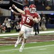 Oklahoma quarterback Baker Mayfield celebrates throwing a long pass for a touchdown