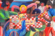 Table crowded with people eating