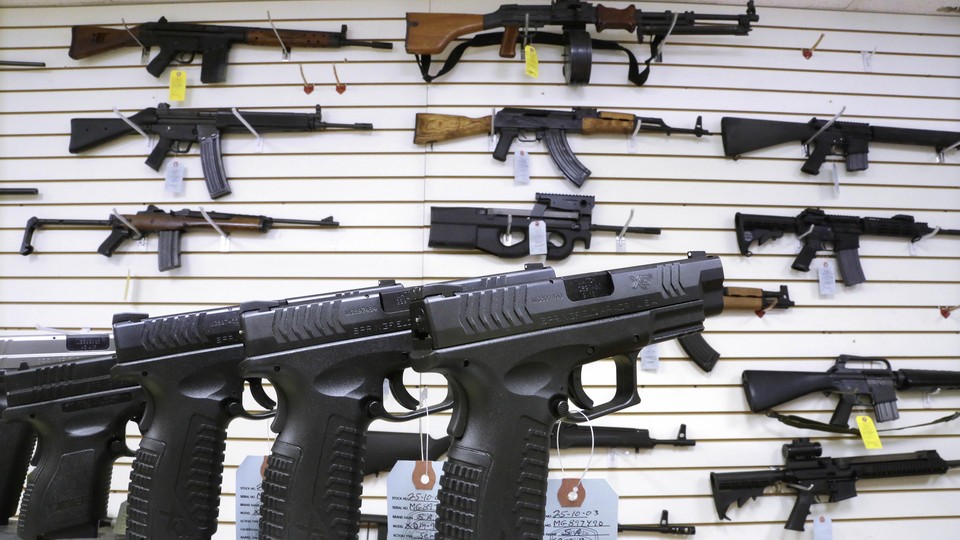 Handguns, rifles, and other guns on display