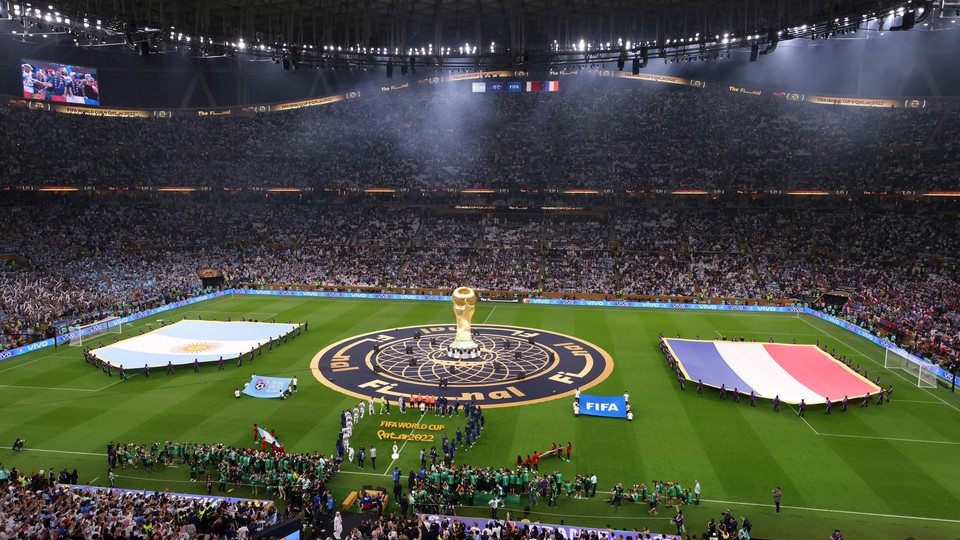 Teams and match officials line up prior to the December 18, 2022 World Cup final between Argentina and France.