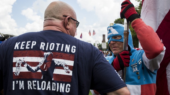 Demonstrator at pro-Trump rally for free speech