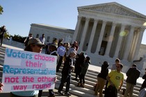 Demonstrators rallied during oral arguments in Gill v. Whitford, a case about partisan gerrymandering in electoral districts, on October 3, 2017.