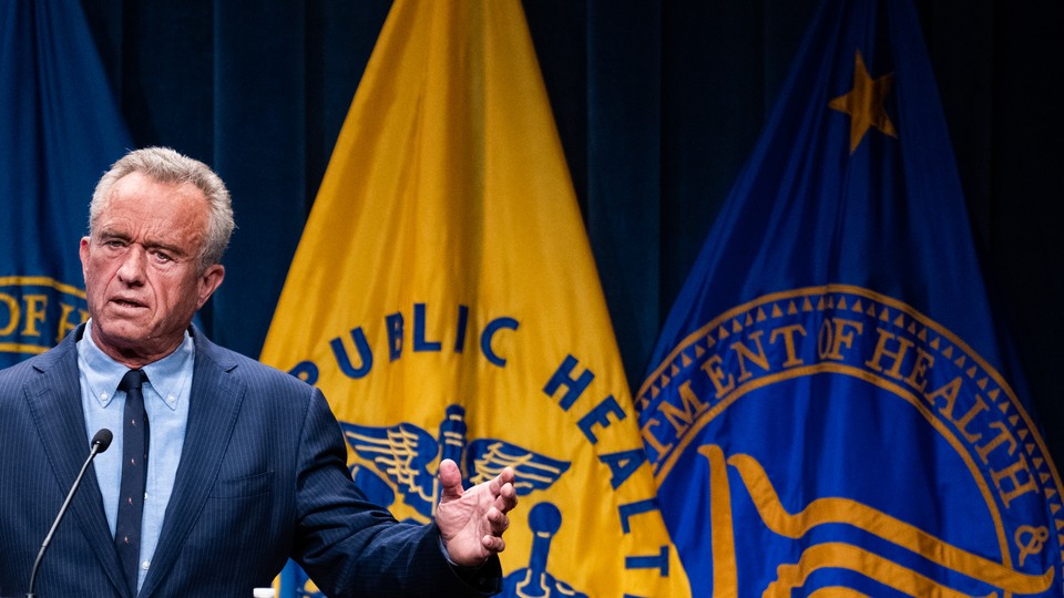 Robert F. Kennedy Jr. speaks from a podium.