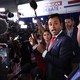 Photo of Vivek Ramaswamy surrounded by media in the debate spin room