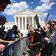 US Supreme Court Police officers put up barricades to separate anti-abortion activists from aborton rights activists during a demonstration in front of the Supreme Court