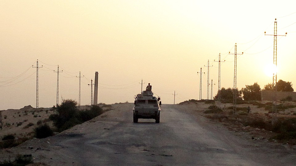 An Egyptian military vehicle on a highway in Northern Sinai