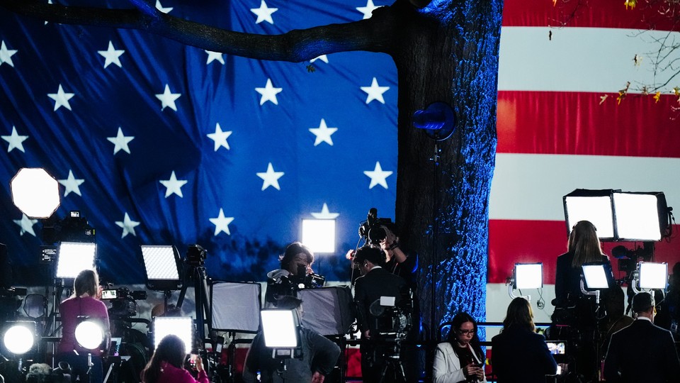 Members of the media work during an Election Night campaign watch party for Democratic presidential nominee Vice President Kamala Harris on Tuesday, Nov. 5, 2024, on the campus of Howard University, in Washington.