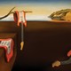 An image showing guitars melting in a dreamy desert landscape