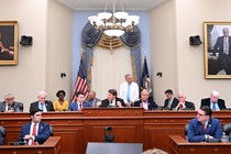 House members sit together