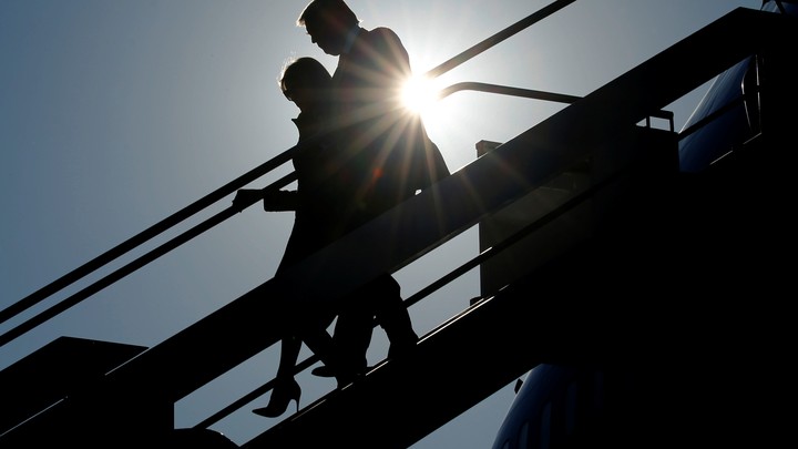 President Donald Trump and First Lady Melania Trump arrive at the airport.