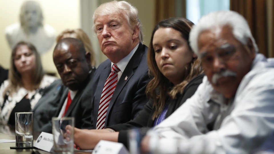 President Trump at a Cabinet Room meeting with family members of Americans killed by undocumented immigrants
