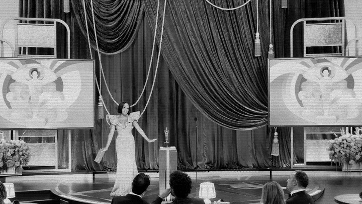 A stylized still of Regina King at the Oscars