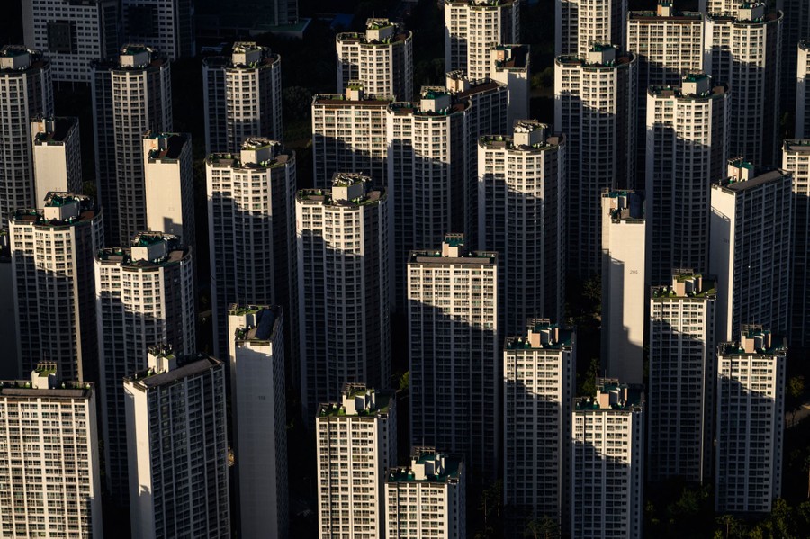 More than a dozen tall residential buildings, seen from above