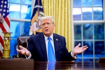 Donald Trump speaks during an executive order signing in the Oval Office