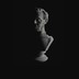 photo of cracked bust of Lincoln on black background