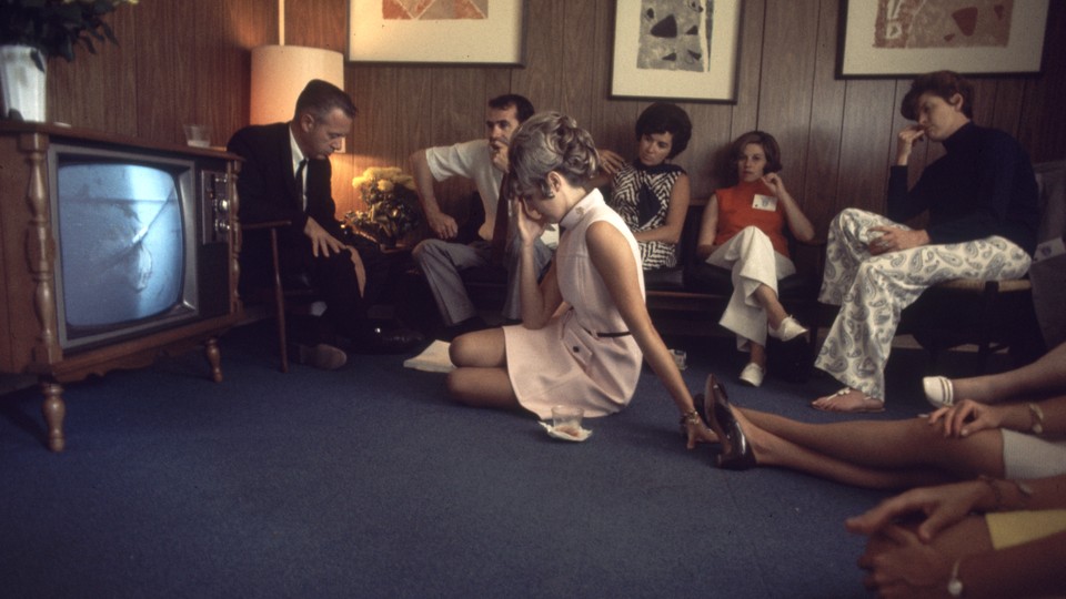 A family watches the launch of NASA's Apollo 10 mission