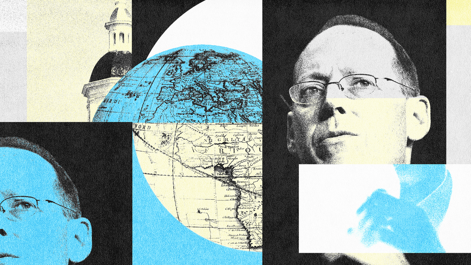 Paul Farmer next to a globe