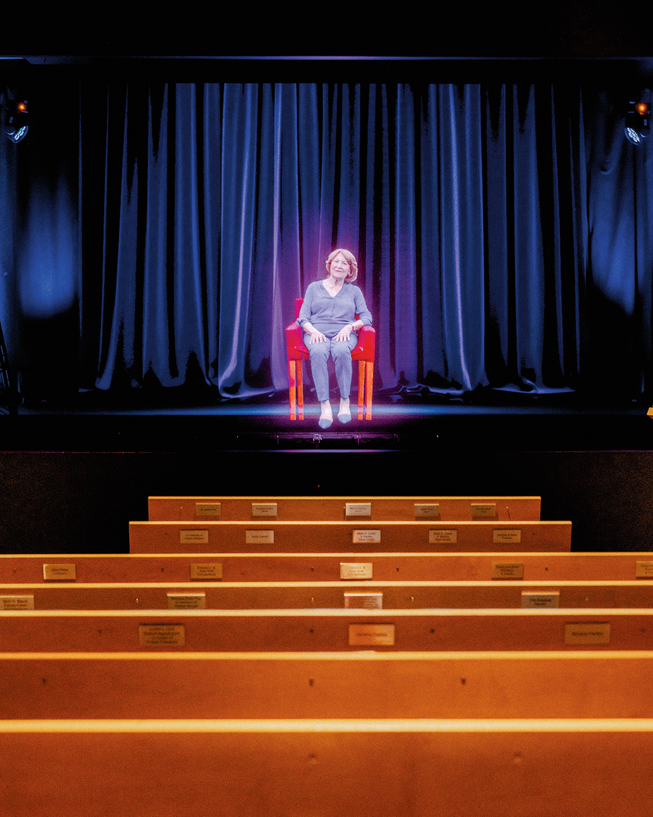 A photograph of a hologram portraying a holocaust survivor.