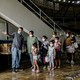 People get assistance at an event center in Louisiana as they evacuate the area ahead of Hurricane Laura.