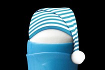An image of a deodorant stick with a night cap
