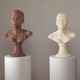 Two busts, one made of chocolate, the other made of soap, for a piece called <i>Lick and Lather</i>, 1993.