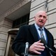 Mark Kelly outside a D.C. courthouse