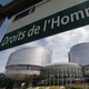 A board reads "Human rights" in front of the European Court of Human Rights in Strasbourg