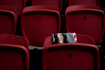 A shirt for Democratic presidential nomineeKamala Harris hangs on a seat before a campaign rally at the University of Nevada at Las Vegas