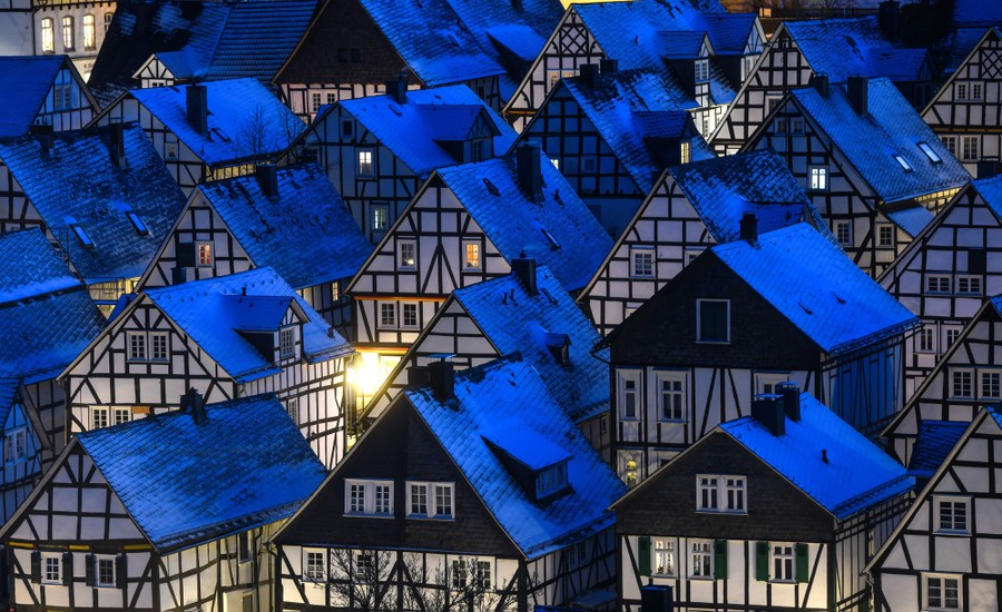 Rows of traditional houses stand in a German town.