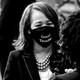 Representative Lisa Blunt Rochester wearing a "good trouble" mask