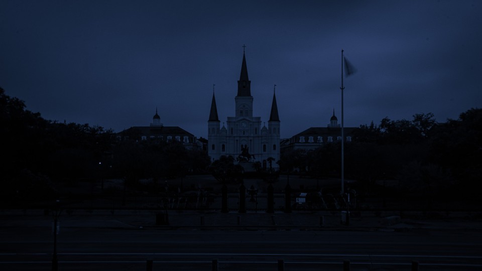 A dark image of Saint Louis Cathedral in New Orleans without electricity