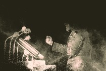 A black-and-white photo of Mussolini appears to disintegrate.