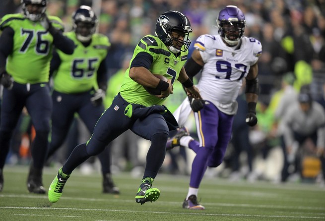 Russell Wilson outshined by Ravens' Lamar Jackson as Seahawks sputter out  in rain, fall to 5-2