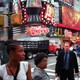 An old photo of Times Square filled with people