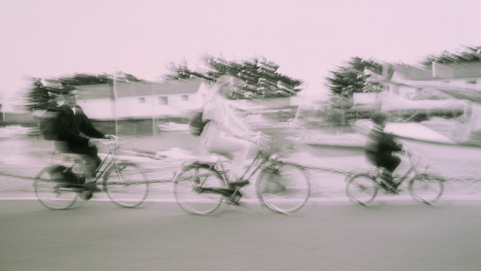 Parents and kids riding bikes
