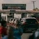 As commuters navigate through the Mandela/Eccles Roundabout, a sign that reads ESSEQUIBO BELONGS TO GUYANA greets commuters on the newly created portion of highway on the East Bank Demerara River, Georgetown, Guyana, on Thursday, Jan. 25, 2024.