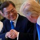 Donald Trump shakes hands with South Korean President Moon Jae-in.