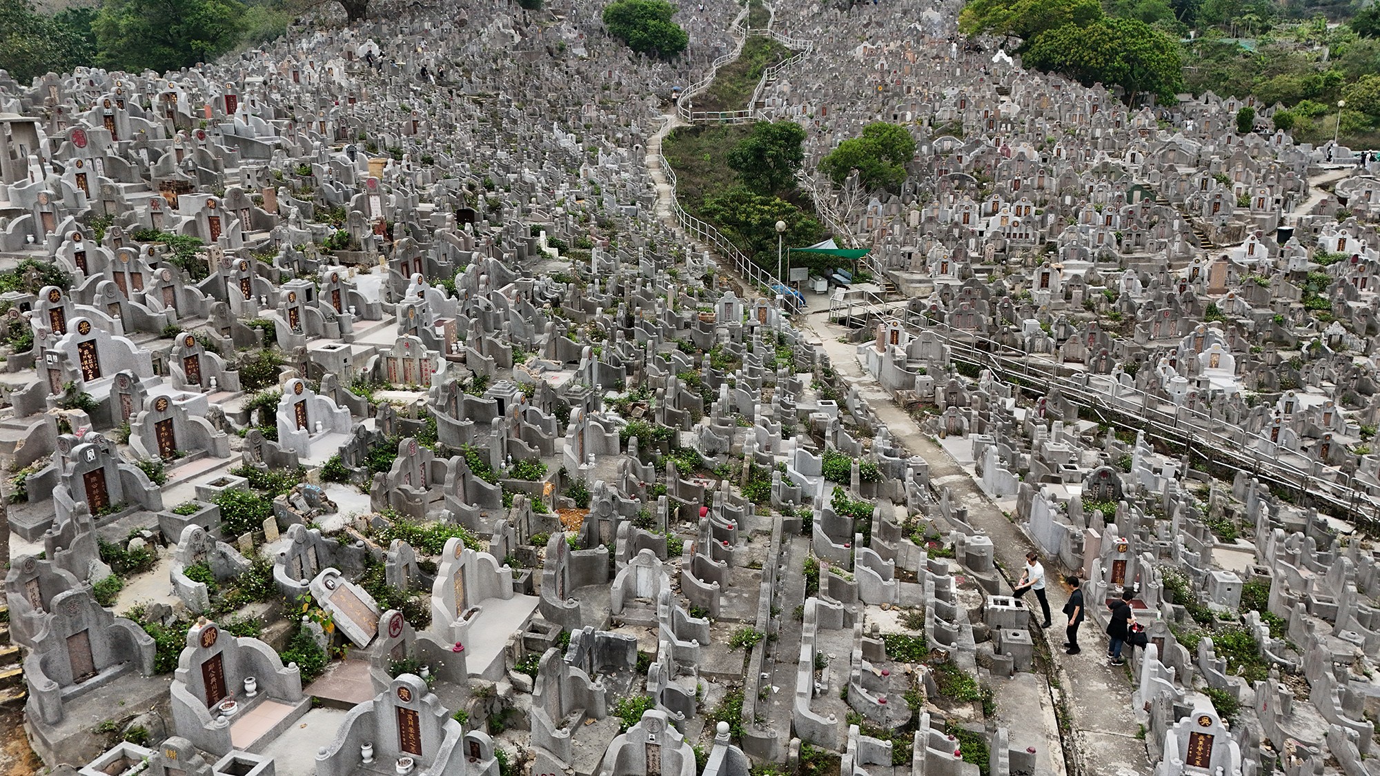 An aerial view of a hillside cemetery in Hong Kong